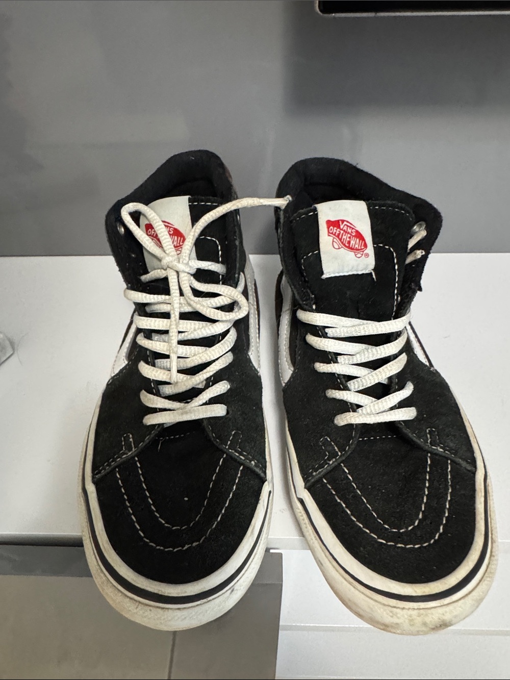 Vans Black and White High-Top Skate Sneakers